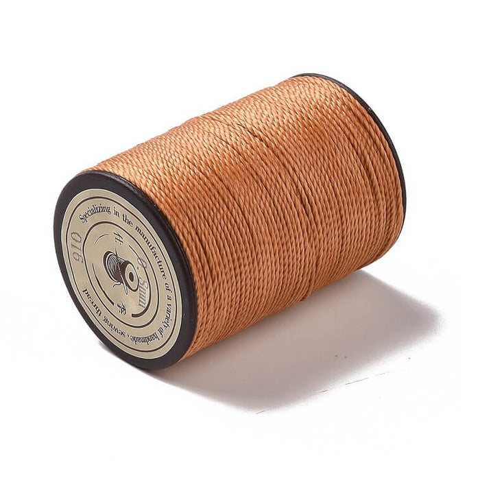 Cordon polyester torsadé ciré Brésilien marron camel 0.8mm (bobine 50m)