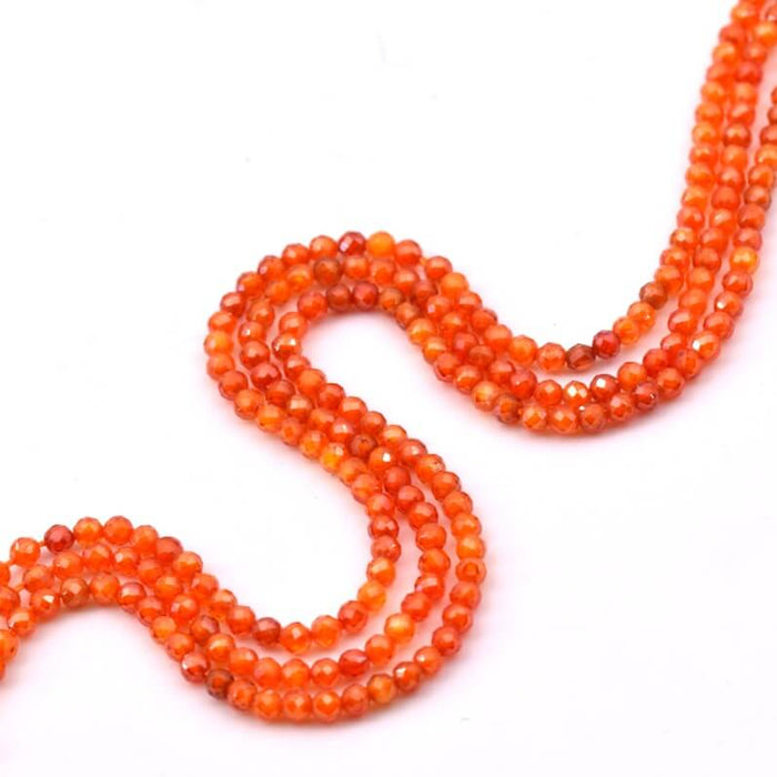 Perle ronde à facettes en zircon orange 2mm (1 fil-37cm)